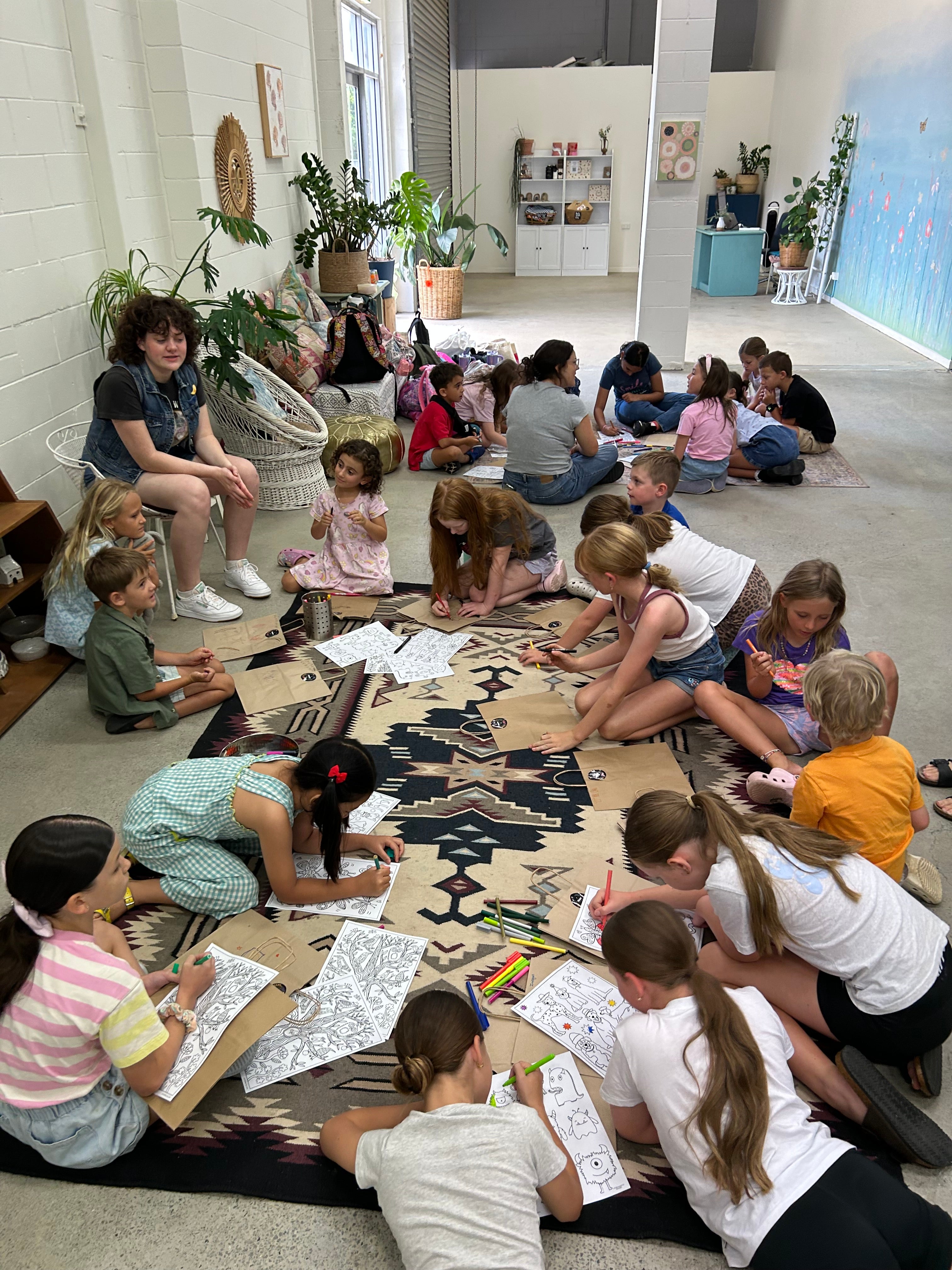 kids sitting on the floor before we start crafting