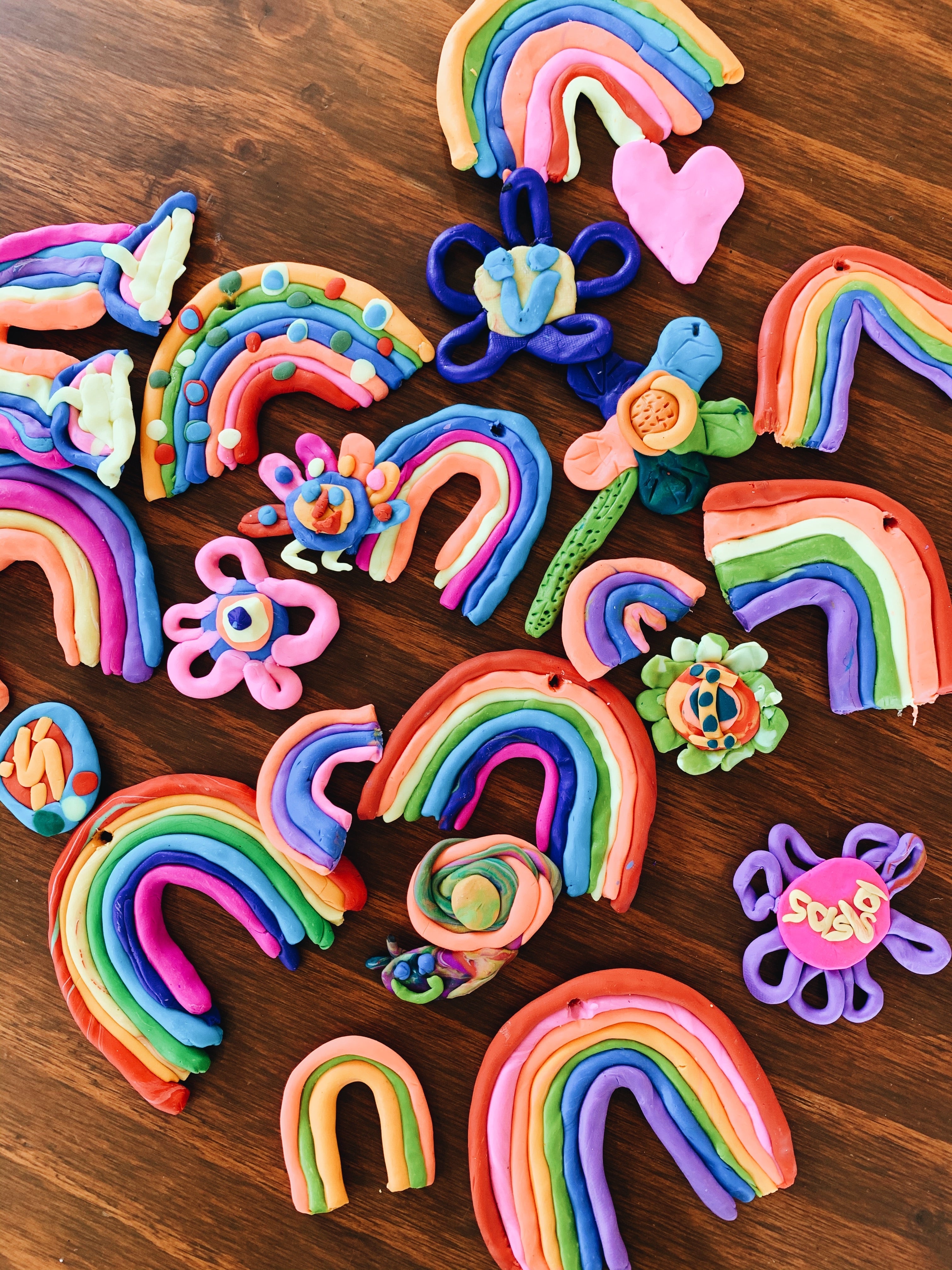 Bright coloured clay rainbows made by kids