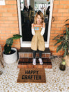 Girl on The Craft Parlour front steps with hand-painted pot