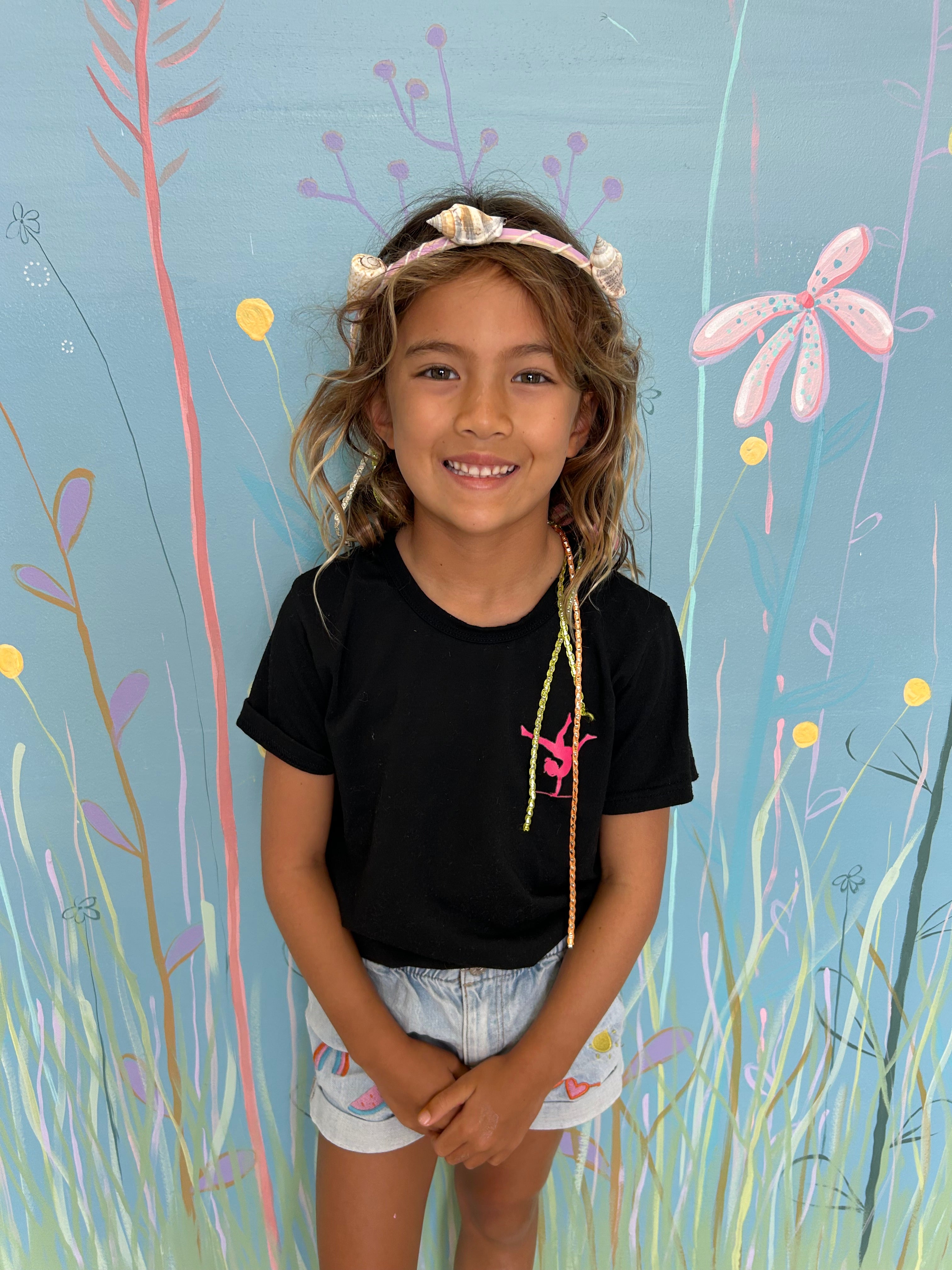 girl wearing a crafty crown that she made