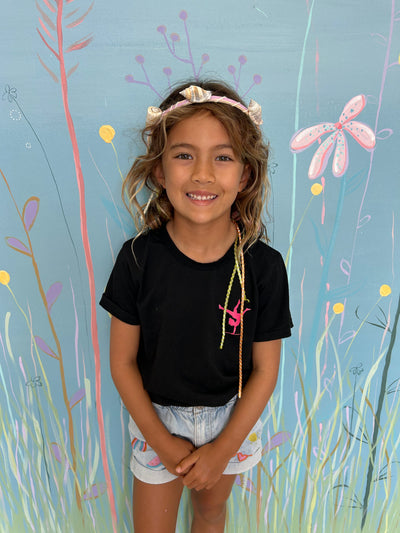 girl wearing a crafty crown that she made