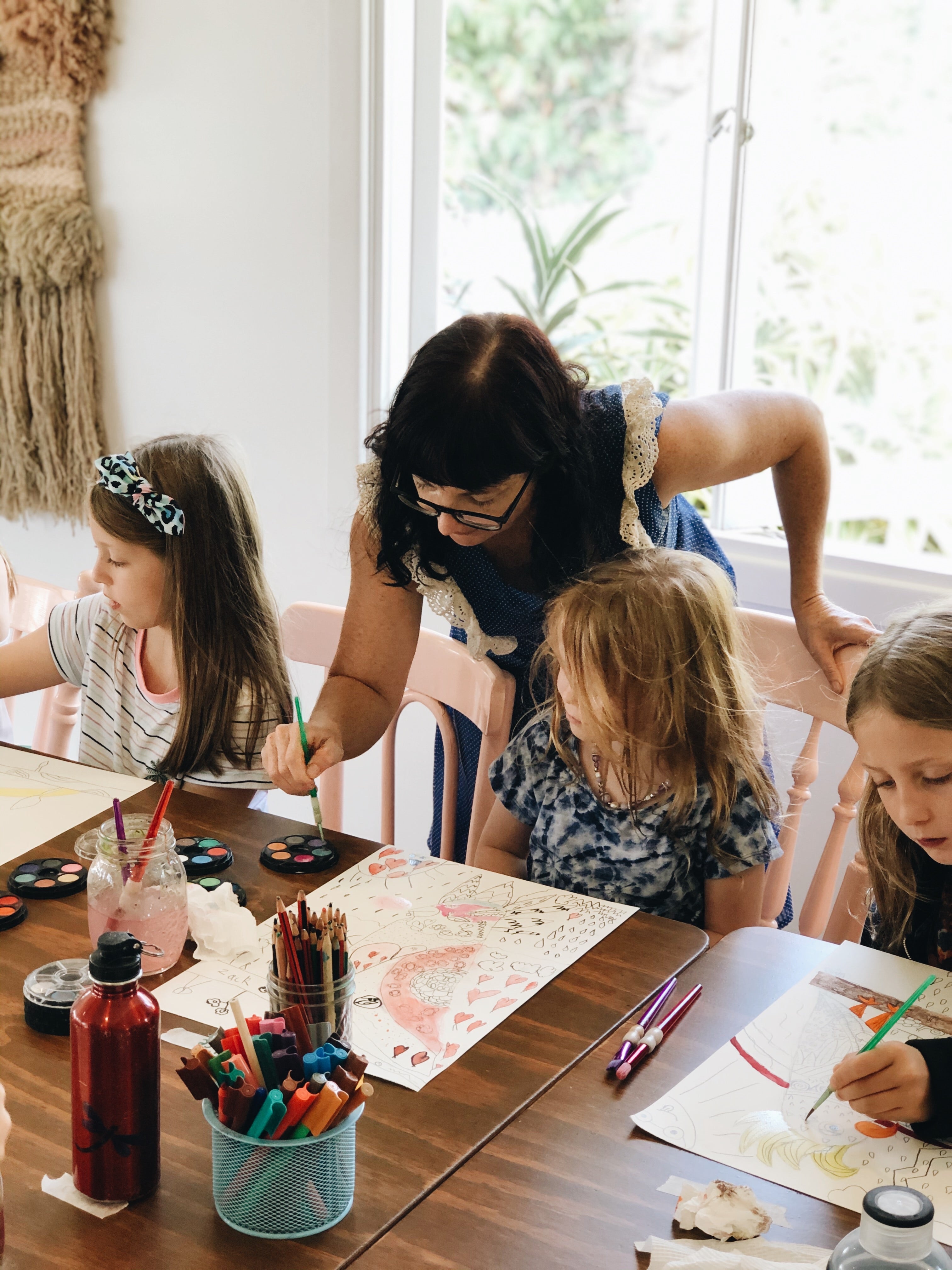 Teacher and children at The Craft Parlour after school Art & Craft club